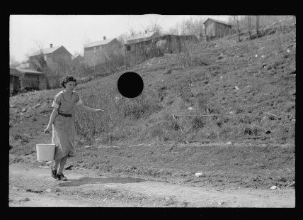 0538_Woman fetching water , Kempton , West Virginia