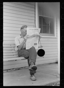 0546_ Reading Newspaper , Tygart Valley Homestead .