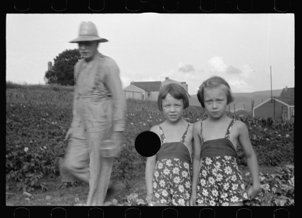 0558_Farmer and his two daughters, Tygart Homesteads