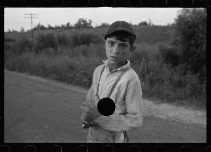 0603_Hispanic boy on road , probably Louisiana
