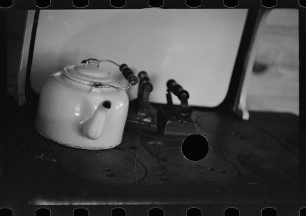 0624_Kettle and irons on kitchen range