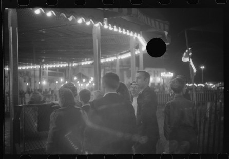 0726_Probably the 'skid' , funfair night scene , location unknown