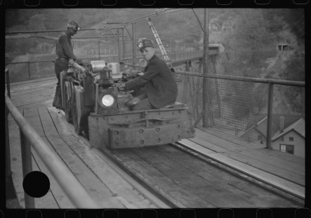 0751_Mine train with two miners , Maidsville, West Virginia