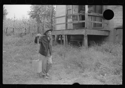 0753_Mexican miner carrying water