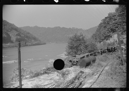 0758_Mining rail track , along side water