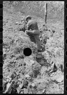 0221_ Man on hillside farm land Garrett County, Maryland